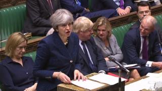 Theresa May addressing MP