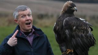 Willie Rennie with a big bird