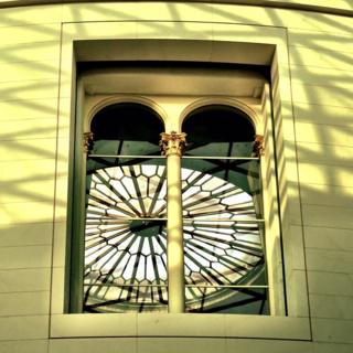 A window reflecting a skylight at sunset at the British Museum