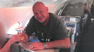 Anthony Kemp in aircraft business class