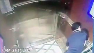 Mr Nguyen Huu Linh hugging a girl in a elevator.