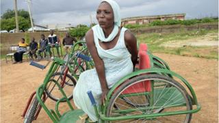 Woman wey get disability.