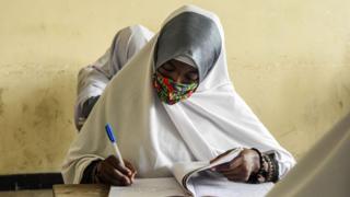 Students attend a class on their first day of re-opened school in Dar es Salaam, Tanzania, on June 1, 2020.