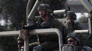 Israeli soldier in tank near Gaza