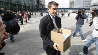 A Lehman Brothers employee leaves the bank's London headquarters after the firm filed for bankruptcy in the US (15/09/2018)