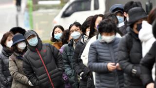 South Koreans wearing face masks, 4 March 2020