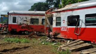 Overturned carriages at the site of the train crash