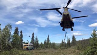 US army Chinook removes the bus