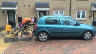 Cycling scarecrow