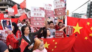 Pro-Chinese government supporters protest in Vancouver