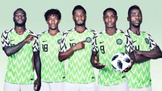 Nigeria-players-posing-in-Nigeria-kit.