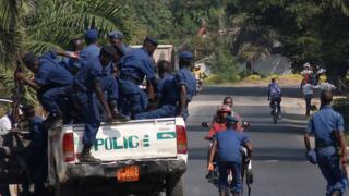Burundian police arrive to set up a road block in the Burundian capital on July 6, 2015