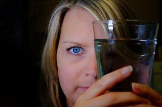 Woman with glass of water