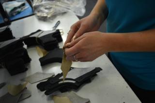 Putting pieces of leather together