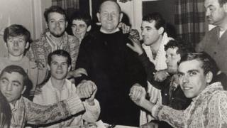 Moelfre Coxswain Dic Evans with the rescued crew of the Nafsiporos