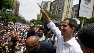 Juan Guaidó gestures to his supporters at a rally in Caracas. Photo: 1 May 2019