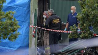 Police arson and explosives squad staff at the scene of the factory fire in Footscray, Melbourne, Victoria, Australia, 2 March 2017.