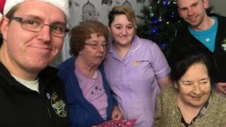 Paul Luke delivering presents