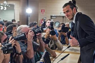 Real Madrid's Welsh midfielder Gareth Bale poses during a press conference in Madrid