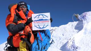 © AFP / Seven Summit Treks Image caption Kami Rita Sherpa broke his own record not just once, but twice after summiting Everest for a 24th time