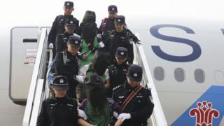 資料圖片:肯尼亞電信詐騙案犯人去年被移送到北京