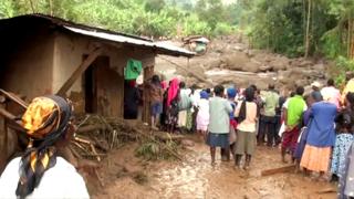 People watching the destruction