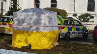 Scene where police are investigating a teenager being stabbed