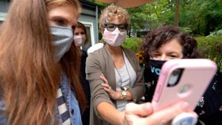 Members of Red, Wine and Blue