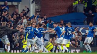 Dominic Calvert-Lewin celebrates with the Everton fans