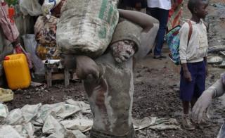 Men work in a construction site in Goma, the capital of North Kivu, eastern Democratic Republic of Congo, April 4, 2018.
