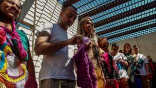 An inmate crochets clothing as part of "Ponto Firme" project in the Adriano Marrey maximum security penitentiary in Guarulhos, Brazil on May 22, 2019.