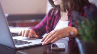Woman using laptop