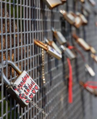 Locks attached to railings