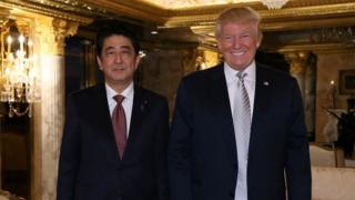 Japan's Prime Minister Shinzo Abe meets with US President-elect Donald Trump