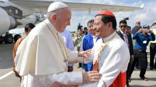 Francis arrives in Myanmar