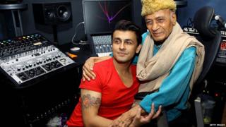 Khayyam (R) and playback singer Sonu Nigam pose during the song recording for the upcoming film 'Gulam Bandhu' in Mumbai on August 31, 2015