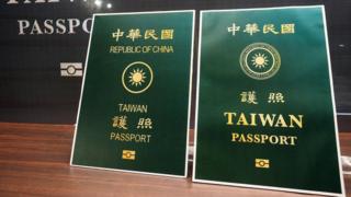 Taiwan unveils its new passport, right, which has the word Taiwan larger and the words Republic of China smaller