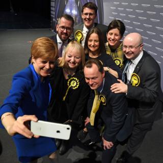 in_pictures Scottish National Party (SNP) leader and Scotland's First Minister Nicola Sturgeon (L) takes a selfie photograph with her Glasgow MPs