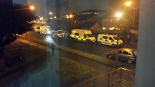 Police vans in Govan