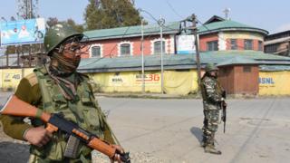 Paramilitary soldiers stand guard during a strike, on October 30, 2019 in Srinagar,