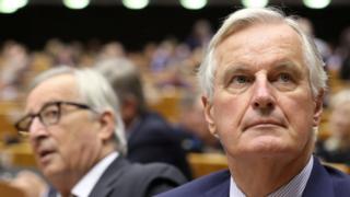 EU chief negotiator Michel Barnier (r) sat with the President of the European Commission Jean-Claude Juncker (l)