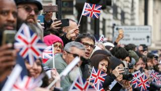 Union Jack flags at a New Year's Day parade