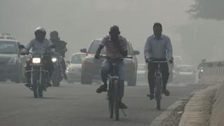 Cars on a smoggy road