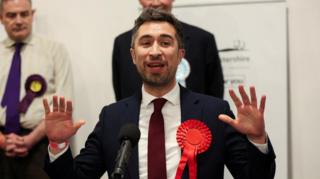 Labour Party candidate Damien Egan reacts after winning the Kingswood Parliamentary by-election at Thornbury Leisure centre in Thornbury, Britain, February 16, 2024.