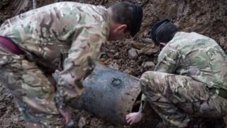 Bomb disposals experts working to make the bomb safe