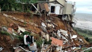 Erosion clear di soil plus part of di house troway.