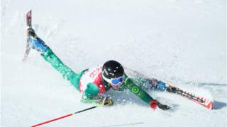 Jonty O'Callaghan of Australia falls over while skiing