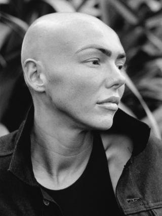 Portrait of a woman with a bald head