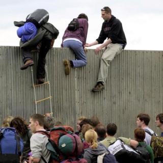 Climbing over the fence in 2000