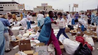 Relief workers carry boxes of medical supplies during the aftermath of the Oklahoma City bombing